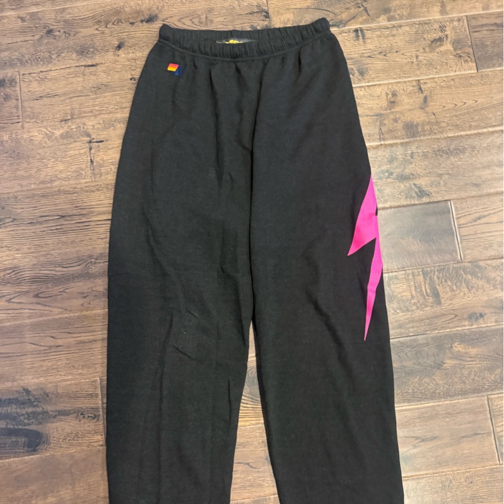 Aviator Nation Black Joggers with Pink Lightning Bolt
